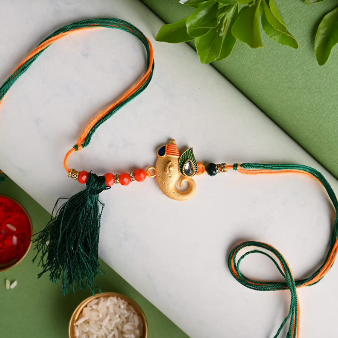 Divine Golden Ganesha Rakhi Divine Golden Ganesha Rakhi