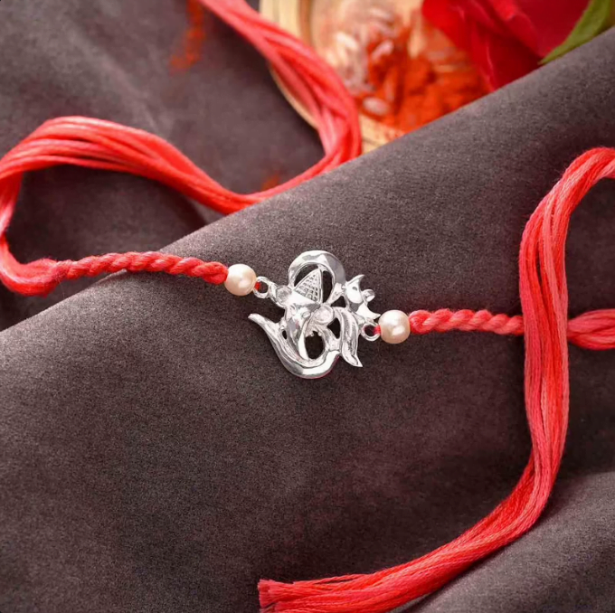 Silver Om Ganesha Studded Rakhi 1250 Om Silver Ganesha