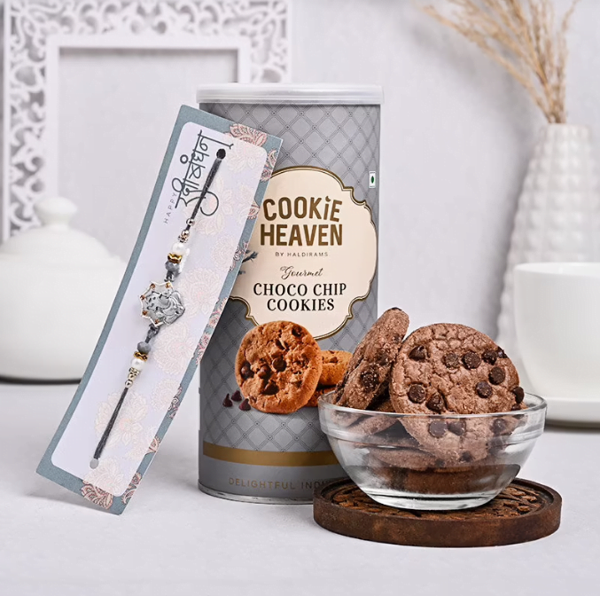 Stunning Silver Ganesha Rakhi N Choco Chip Cookies 625 Stunning Silver Ganesha Rakhi N Choco Chip Cookies 625