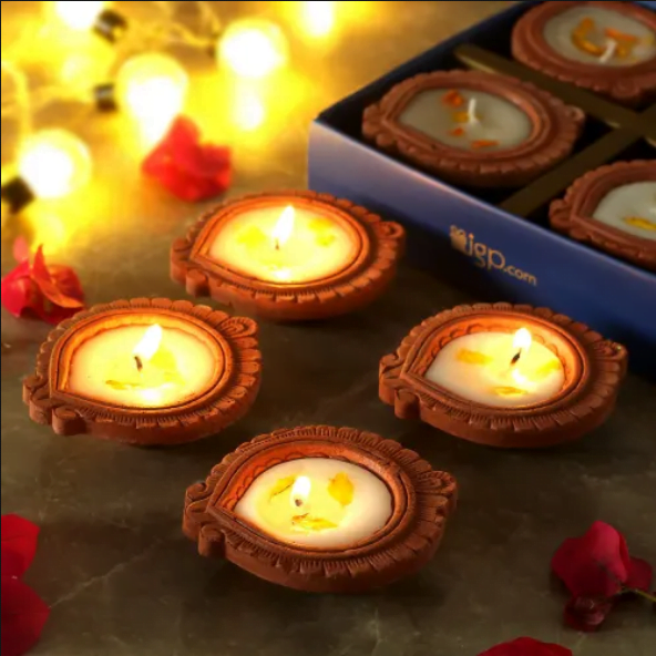 Clay Diya with Flower Petals (Set of 4) Clay Diya with Flower Petals (Set of 4)